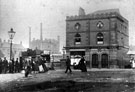 Lady's Bridge and No. 34 Waingate, former Elephant and Castle Tea Co., tea dealers, Tower Grinding Wheel in background