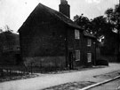 Part of a group of cottages called Piper Houses on Piper Lane (now Herries Road)