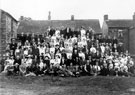 Group of Southey villagers at the back of Southey Manor