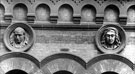 Two of five carvings on the facade of School of Art and Design, Arundel Street.