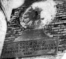 Plaque with the inscription, 'Nursery Steam Grinding Wheel. Rebuilt by W. Chadburn, 1825.' Situated on the Johnson Street side of the Shiloh Works (main entrance off Stanley Street). Refers to William Chadburn, Brass and Iron Founder