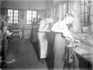 View: s10212 Cutlery manufacture, filing rough edges from scissor handles at Needham, Veall and Tyzack Ltd., cutlery manufacturers, Eye Witness Works, Milton Street