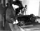 Woman worker in the umbrella department at Samuel Fox and Co. Ltd, Stocksbridge