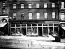 King Street showing Nos. 7 - 9 Thomas Porter and Sons, tea and coffee merchants and Nos.11 - 15 Porter, Wright and Co., Ltd., wine and spirit merchants, 