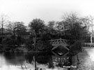 Lake and footbridge, Weston Park. Note the observatory (left) behind the trees