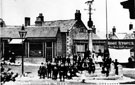 Woodhouse Market Cross and stocks, Market Square, Woodhouse. Market Place, left. The cross was erected in 1775 by Joshua Littlewood. A sun dial and weather vane were added in 1826