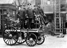 Firemen including Superintendant William Frost and a horse drawn steam boiler outside West Bar fire station