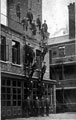 Firemen on Training Exercise early 1900's outside Rockingham Street Fire Station showing the Firemen's Flats