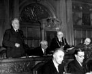 City Council in Session, Alderman Frank Thraves, C.B.E., J.P., Chairman of the Watch Committee, speaking, Lord Mayor, Alderman C.W. Gascoigne, Deputy Lord Mayor, centre, Ernest Storm Graham, right