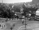 Elevated view of Bellhouse Road looking towards the Flower Estate with shops, National Provincial Bank, (No. 127) Wharncliffe Hotel and St. Hilda's Church in view
