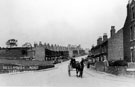 View: s13470 Looking up Bellhouse Road from Firth Park Road towards Pismire Hill