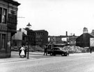 Demolition of buildings on Bramall Lane and Hermitage Street, Queen Adelaide Hotel on left