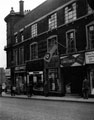 Cambridge Street at Moorhead, Sun Offices including No. 74 Direct (Curtains) Ltd., soft furnishings, No. 72 Home Farm Products Ltd., pork butchers, No 70 R.A.F. Recruiting Centre and Information Bureau, Maison Constance, ladies hairdresser