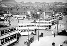 View: s15824 Traffic congestion at Firth Park roundabout, Firth Park Road showing bottom of Bellhouse Road, St. Hilda's Church and housing