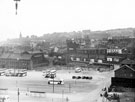 View: s15867 Pond Street bus station showing Harmer Lane with Joseph Rodgers and Sons Ltd., cutlery manufacturers, Sheaf Island Works and housing in the Park district soon to be demolished