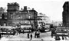 View: s16030 Fitzalan Square at junction of High Street, Haymarket (in background) and Commercial Street (right), Fitzalan Chambers, Fitzalan Market Hall, including Stables and Co., tea dealers, left