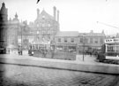 Fitzalan Square, 1895-1915, (l. to r.), Birmingham District and Counties Banking Co. Ltd, Wonderland entertainment booth, Bell Hotel, J. and F. Ibbotson, woollen merchants