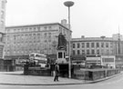 View: s16076 Fitzalan Square looking towards High Street, premises include Nos. 59 - 65 C and A Modes Ltd., No. 73, W. Barratt and Co. Ltd., boot and shoe dealers, No. 75 G.A. Dunn and Co. Ltd., hatters, No. 77 Newmans (Provincial) Ltd., costumiers