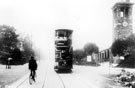 View: s16486 Tram No. 107 on its way to Woodseats, outside Firth Park clock tower pavilion, Firth Park Road. In service 1900-1952, top covered in 1909