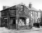 Handsworth and Woodhouse Industrial Co-operative Society Ltd., Branch No. 7, No. 38 Normanton Springs, prior to modernization (street sign on wall reads Linneker's Cottages)