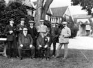 Unidentified group of eight men outside Knoll Top, Stocksbridge