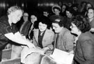 Miss Eva Rich, Sheffield Soprano, taking choir practise