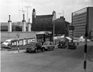 View: s17458 Howard Street, looking towards Sheaf Square fountain and Sheaf House, premises include No. 45 The Cossack public house, No. 53 Milners, house furnishers, No. 57 Howard Hotel