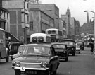 View: s18067 The Moor looking towards Pinstone Street, Roberts Brothers, Rockingham House, department store, in background