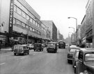 View: s18079 The Moor, Roberts Brothers, Rockingham House, department store, foreground, Pauldens Ltd., in background