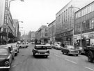 View: s18080 The Moor, Roberts Brothers, Rockingham House, department store and British Homes Stores, foreground, Pauldens Ltd., in background