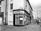 View: s18083 The Moor at junction with Thomas Street showing Blitz damage, Nos.134 - 136 The Moor Drapery Stores