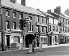 View: s18366 Norfolk Street at Cadman Lane, premises include Nos. 133 -135 Thomas Morrison, tailor, No. 137 Bruce and Co., jewellers