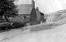 The 'Ullet', (Owlet Lane) looking towards Wincobank Hill, showing the old smithy which belonged to Sammy Hawkins, nailmaker and pinder of the village 1900-1920