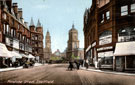 View: s18748 Pinstone Street looking towards St. Paul's Church, Blooms Ltd., opticians on corner