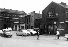 View: s19471 Shude Hill from junction with Shude Lane, showing No. 32 Shude Hill, J. and S. F. Marsden Ltd., rabbit skin dealers, No. 28 former premises of Lonsdale and Thompson Ltd., egg importers