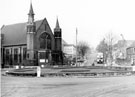 View: s19480 Firth Park roundabout looking up Sicey Avenue showing Firth Park United Methodist Church and Fine Fare Supermarket