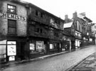 View: s19544 Snig Hill from West Bar, derelict timber framed shops, prior to demolition in 1900