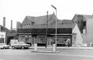 View: s19559 Snig Hill, empty shop at junction with Water Lane, buildings in background belong to Duncan Gilmour and Co. Ltd., Lady's Bridge Brewery