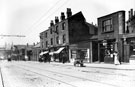 View: s19628 Spital Hill showing Nos. 83 Thorneloe and Co., watch makers, 81 W Hewitt, coal merchant, 79 J W Storey, newsagent also 59 Midland Railway stables, Spital Hill looking towards The Wicker Arches