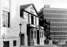 View: s19711 Surrey Street from outside Central Library. United Methodist Church and former School of Medicine, then occupied by Army Information Office. College of Technology in background