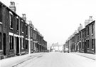 View: s19817 Nos. 36, 38, 40 etc.(right) and Nos. 33, 35 etc., Swarcliffe Road, Darnall looking towards Shirland Road and housing on Candow Street