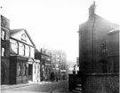 View: s19848 Surrey Street looking towards Arundel Street and College of Arts and Crafts. Leader House, right. Surrey Street United Methodist Church and former College of Medicine, left