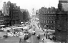 Elevated view of Town Hall Square and Fargate, 1950-1955, including No 66, Fleur de Lys public house, (Bovril sign) and Bank Chambers, left. Albany Hotel and Yorkshire Penny Bank, right. Town Hall Square Rockery in foreground