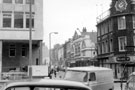 Union Street from Furnival Street showing (right) P.W. Lacey Ltd., footwear and outfitters, former Newton Chambers, Tudor House, formerly Newton House, right. Union Street Picture Palace in background