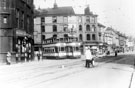 Trams at the junction with Nursery Street and The Wicker taken from Lady's Bridge showing Williams Deacon's Bank, Grosvenor House (also known as Grosvenor Temperance Hotel and The Lion Hotel) and No. 2 Frank Wilkins, jeweller