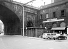 View: s20601 Wicker Arches showing Frank Richardson's pet store and public lavatories