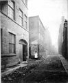 View: s22544 Mulberry Street looking towards High Street. Premises of Pawson and Brailsford, printers, left. Lamp on right belongs to Mulberry Tavern