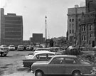 View: s23007 Construction of Arundel Gate outside Sheffield College of Technology (later Owen Building, Sheffield Hallam University) and Central Library (right)