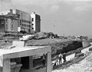 View: s23024 Construction of a subway under Arundel Gate with Leader House and Cenral Library in the background