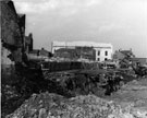 View: s23032 Construction of Arundel Gate showing the remains of Eyre Street with Leader House and Central Library in the background